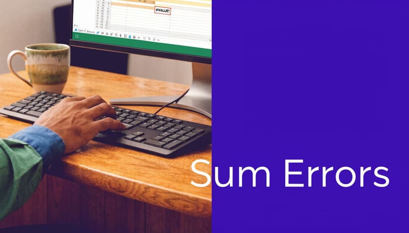 A person working at a computer desk seeing a spreadsheet error while trying to add cells.